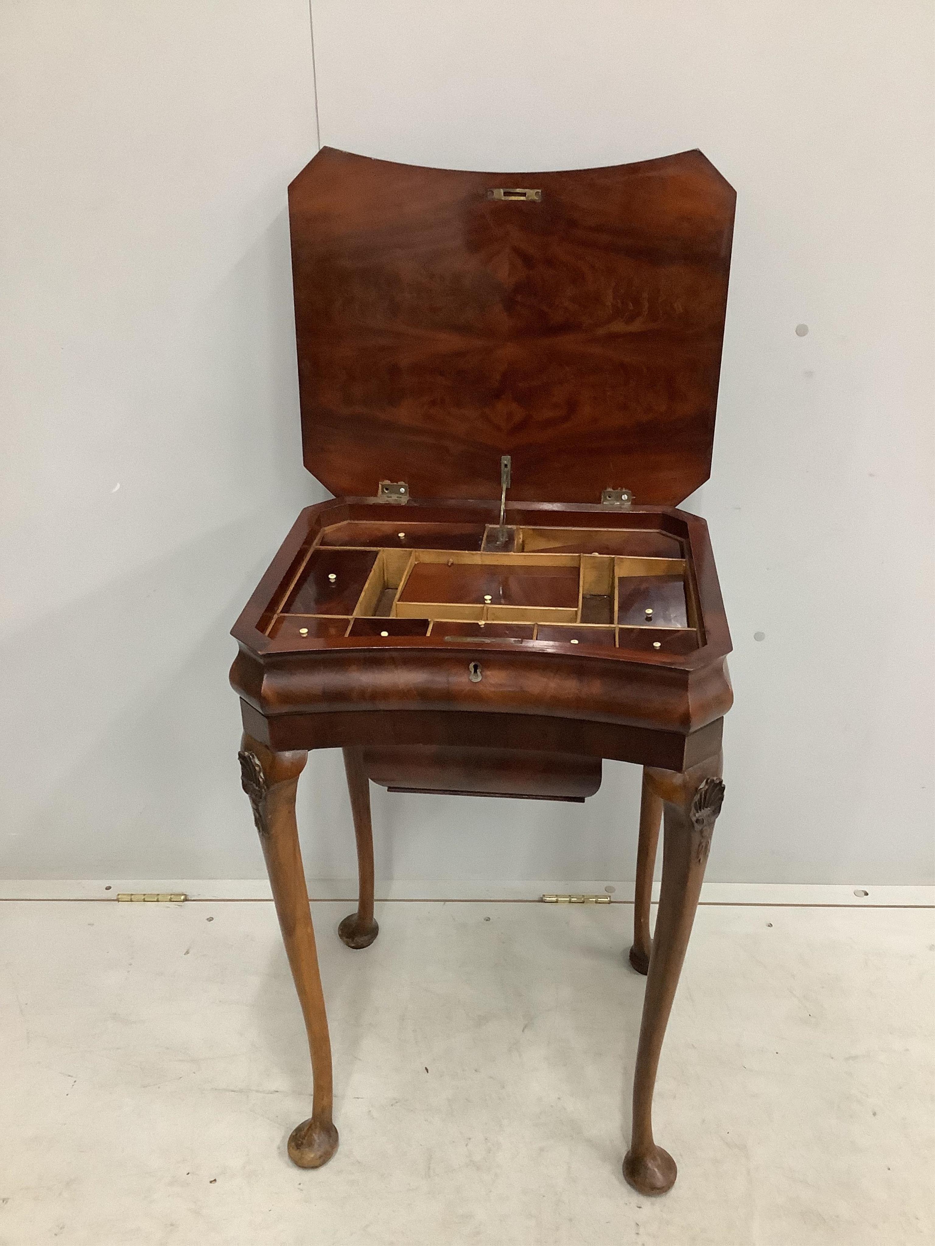 A Queen Anne Revival mahogany and beech concave front work table, width 50cm, depth 40cm, height 74cm. Condition - fair